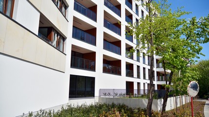 Modern apartment building  on a sunny day with a blue sky. Facade of a modern apartment.