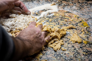 Kneading homemade whole wheat pasta