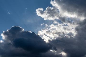 Scenic cloudy blue sky. Sunlight in high large dramatic cloudscape moody background