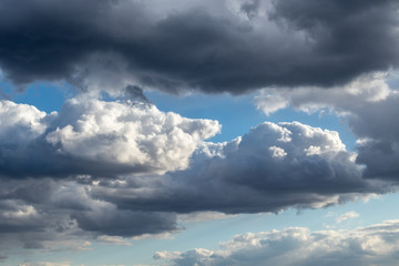 Scenic cloudy blue sky. Sunlight in high large dramatic cloudscape moody background
