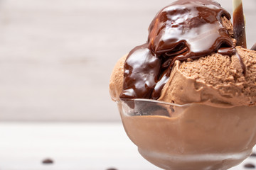 Chocolate ice cream ball in a glass