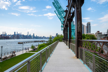Old renovated cranes in Domino park sign in Williamsburg, New York.