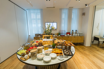 Breakfast served on buffet table in hotel restaurant