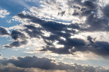 Fototapeta na wymiar Scenic clouds imagination sky. Sunlight in high large dramatic cloudscape moody background