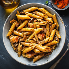 Pasta penne with mushrooms and sauce
