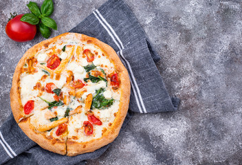 Italian pizza with tomato, mozzarella and chicken