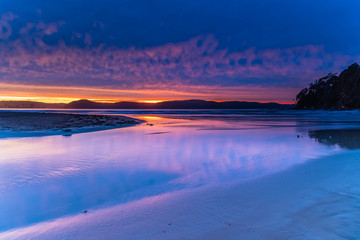 Stratocumulus Cloud Covered Sunrise Seascape
