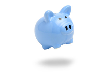 Blue piggy bank on a white background. Isolated.
