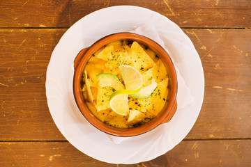 tortilla bowl with cheese and lime