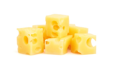 Many pieceses of cheese on white