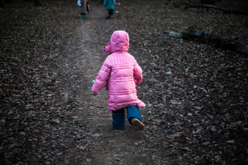 Girl runs along the track