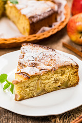 Apple Cinnamon Cake or French Apple Pie with Chunks of Sweet Apples. Selective focus.