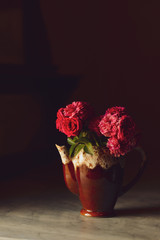 red roses in a vase