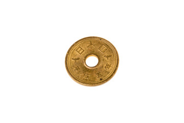 Gold Five Yen Coin Japanese on white background . Money Exchange and have meaning of Good luck . Luxury and fortune coins in Japanese belief. symbol of Japan economy and financial.
