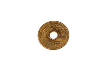 Gold Five Yen Coin Japanese on white background . Money Exchange and have meaning of Good luck . Luxury and fortune coins in Japanese belief. symbol of Japan economy and financial.
