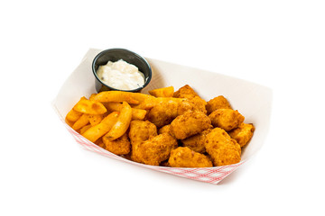 Crispy Seafood Fish Bites Snack Size. Serving Size of Deep Fried Pollock Fish Fingers and French Fried Potatoes with Tartar Dipping Sauce Isolated on White Background. Selective focus.