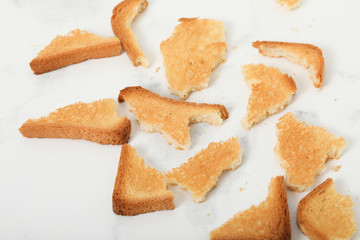 Toast biscuits over white background crunchy food