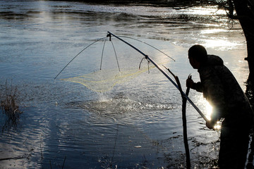 poacher fishing net in spawning season