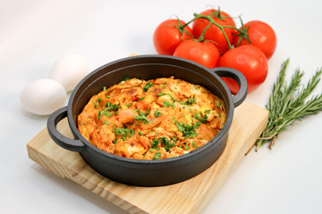 fried eggs in a pan