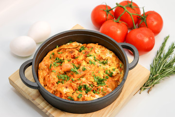 fried eggs in a pan