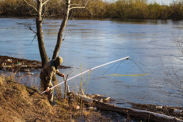 poacher fishing net in spawning season