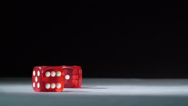 Dice on craps table in casino