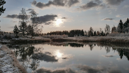 Fototapeta na wymiar Finnish archipelago. Reflecting surface. Beautiful Nordic nature