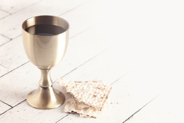 Holy Communion or the Lords Supper on a White Wooden Table