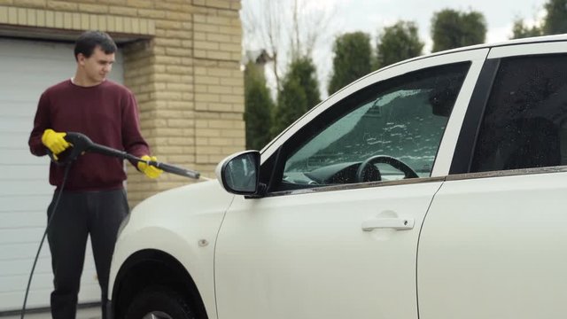 Washing of high-priced car, car washing process karcher and soap.
