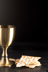 Communion or the Lords Supper on a Black Wood Table