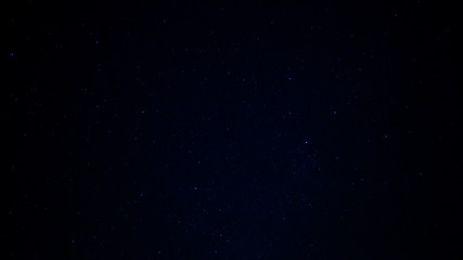 Black Night Sky Filled with Countless Stars in Outer Space