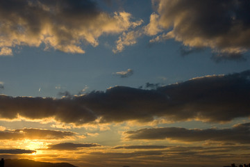 Fototapeta na wymiar 青空と雲と夕陽