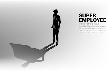 Silhouette of businessman and his shadow of superhero.concept of empower potential and human resource management