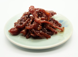 sliced sheets of dried and crispy pork
