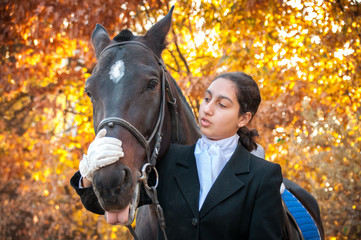 Beautiful Smiling Girl Jockey Stand Next To Her Brown Horse Wearing Special