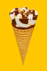 angle view fresh vanilla flaovr ice cream cone with chocolate on a yellow background