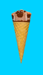 side view chocolate flavor ice cream cone on a blue background