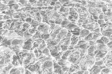 Waves Pattern in crystal clear water on black and white