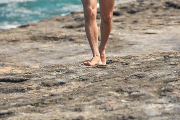 Barefoot walking on the rock