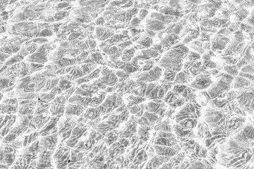 Waves Pattern in crystal clear water on black and white