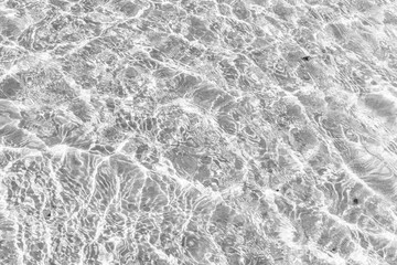 Waves Pattern in crystal clear water on black and white