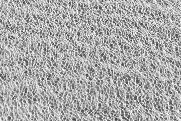 Waves Pattern in crystal clear water on black and white