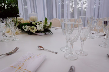 decoration elements for banquets and parties, chocolate, candles, flowers, glasses