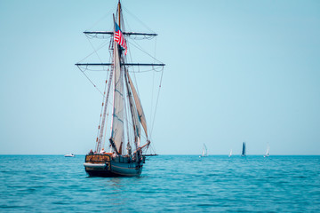 Fototapeta na wymiar Tall ship sailing on Lake Michigan in South Haven Michigan on a clear day