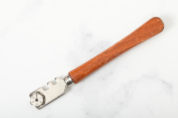 Glass cutter on white background metal tool