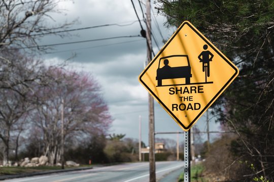 warning sign on a road-SHARE THE ROAD