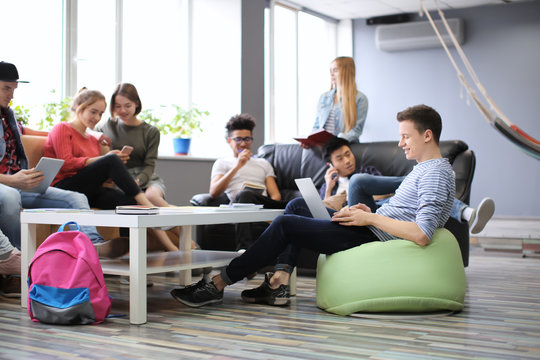 Students resting together in campus building