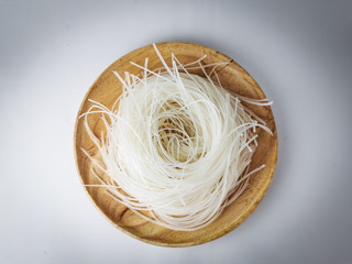 Raw White  Noodle in a wooden tray