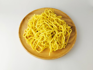 Egg Noodles in a wooden tray 