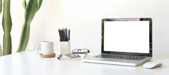 Workspace desk and laptop. copy space and blank screen. Business image, Blank screen laptop and supplies.